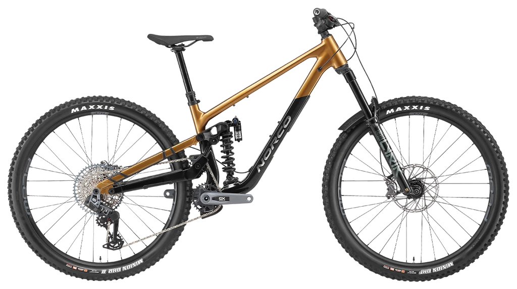 Mountain bike with a gold frame and black components on a white background