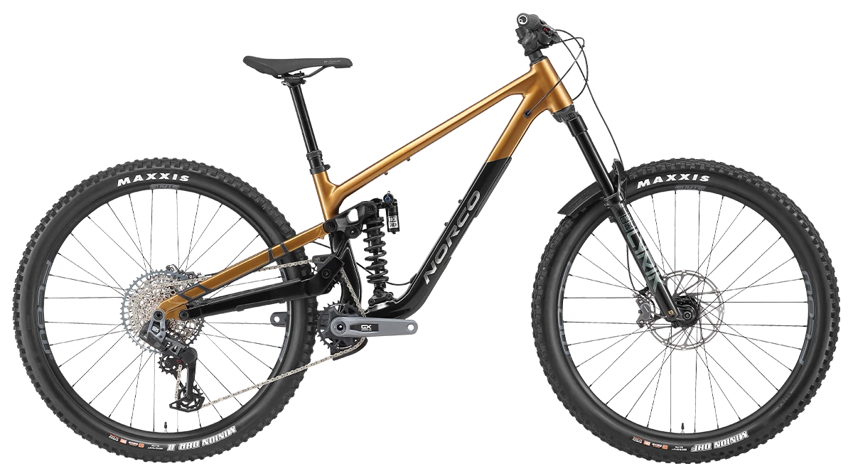 Mountain bike with a gold frame and black components on a white background