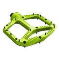 Green bicycle pedal on a white background