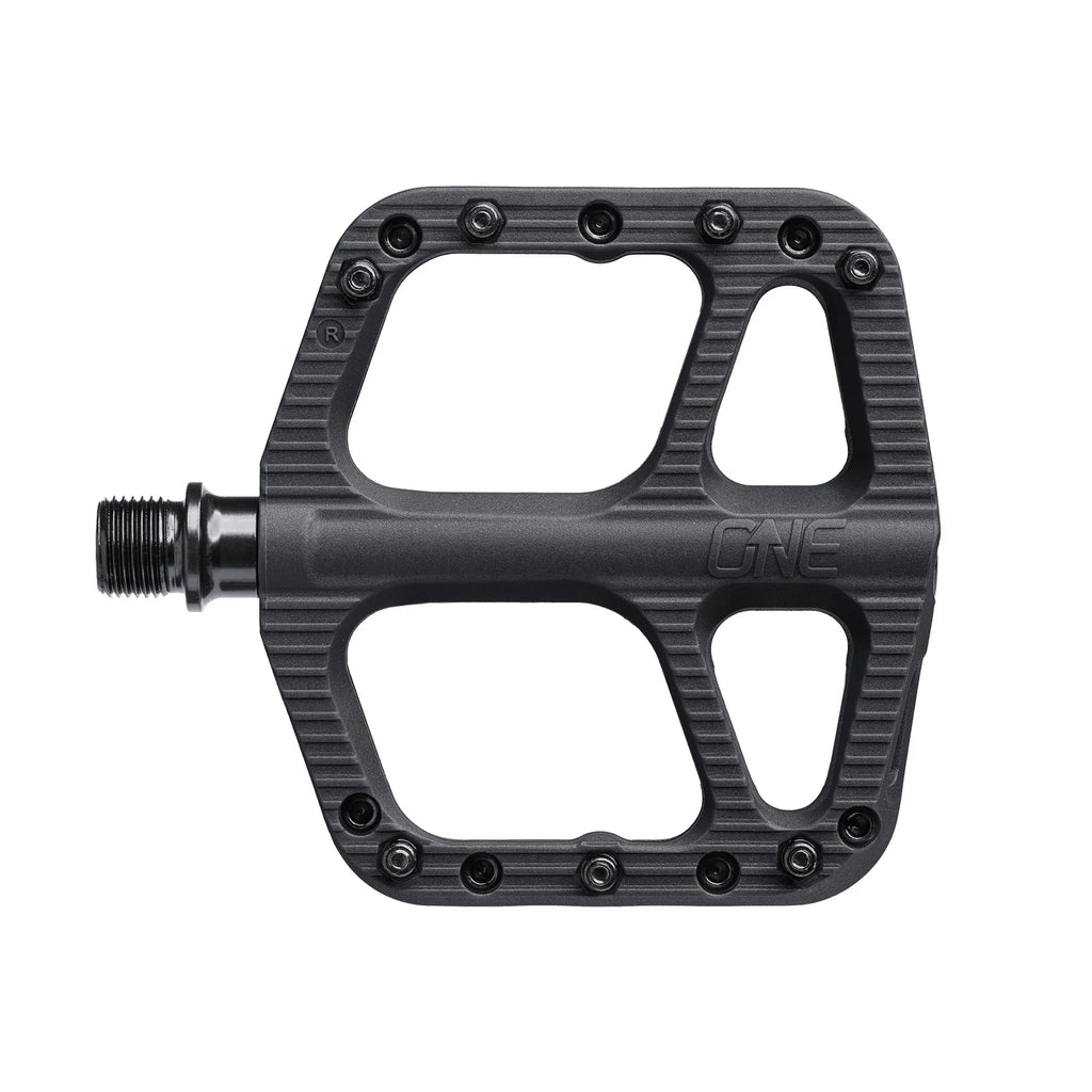 Black bicycle pedal with 'ONE' branding on a white background