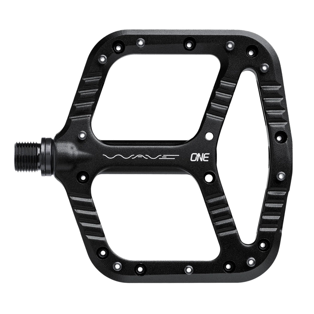 A black metal bicycle pedal with a spoked drop-through design, featuring the 'WAVE ONE' branding in white on the center, set against a plain white background.