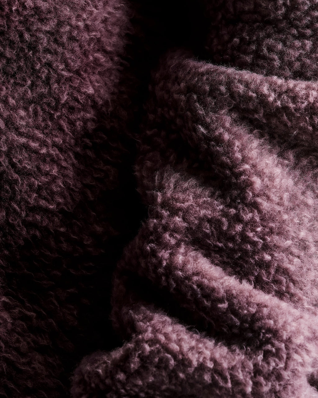 Close-up of textured purple fabric