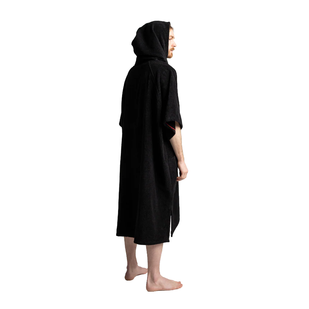Person wearing a black hooded garment on a white background