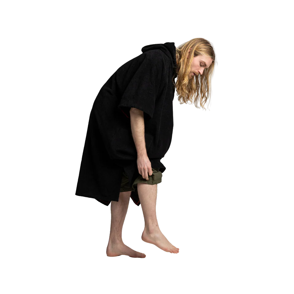 A person wearing a black hooded robe or poncho-style garment, shown from the back against a plain white background.