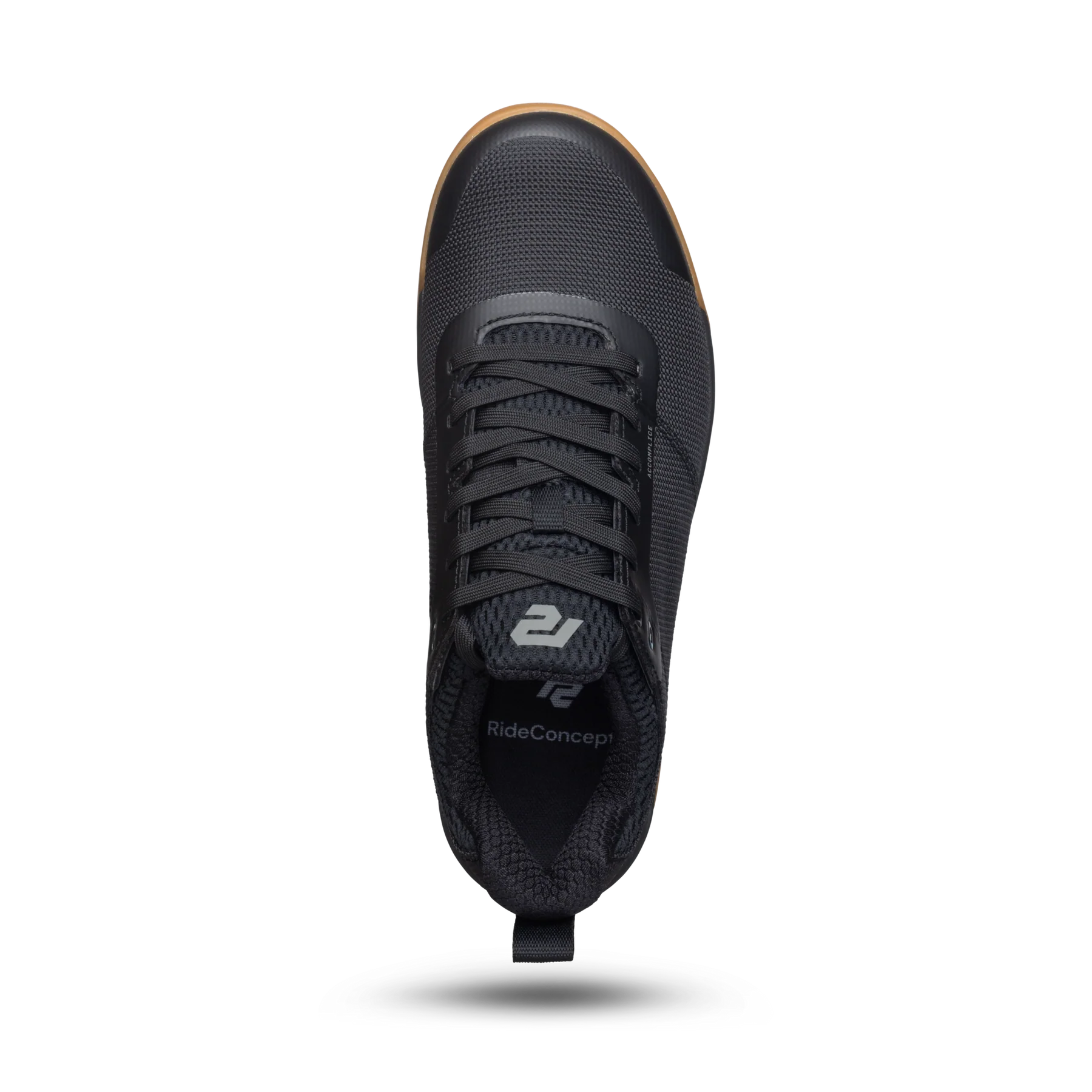 Black sneaker with visible brand logo on a white background