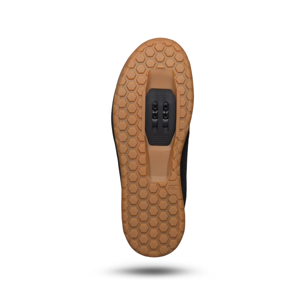 Brown shoe sole with a textured pattern on a white background