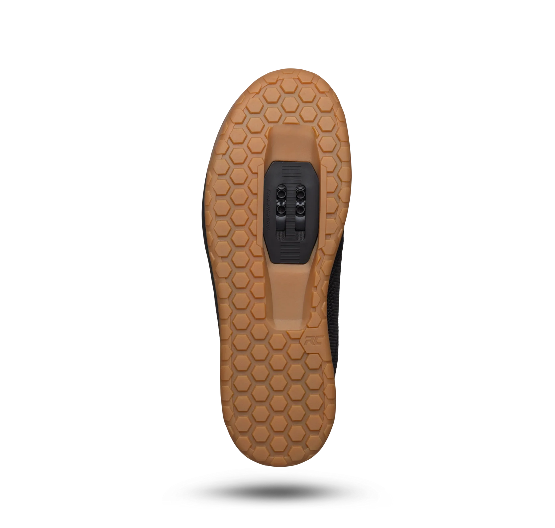 Brown shoe sole with a textured pattern on a white background