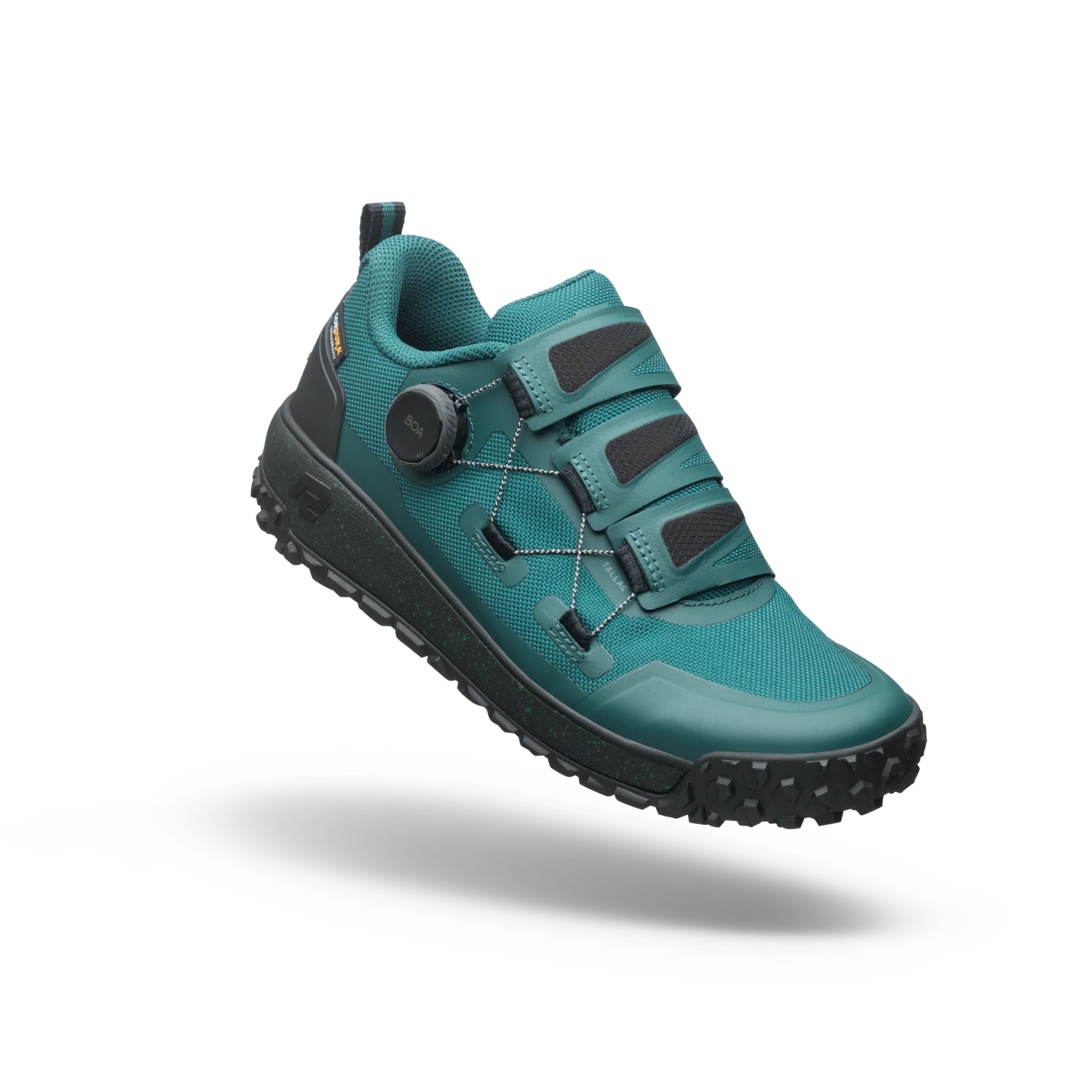 Teal hiking shoe with black sole on a white background