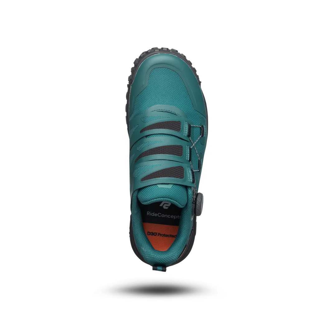 Teal cycling shoe with brand logo on a white background