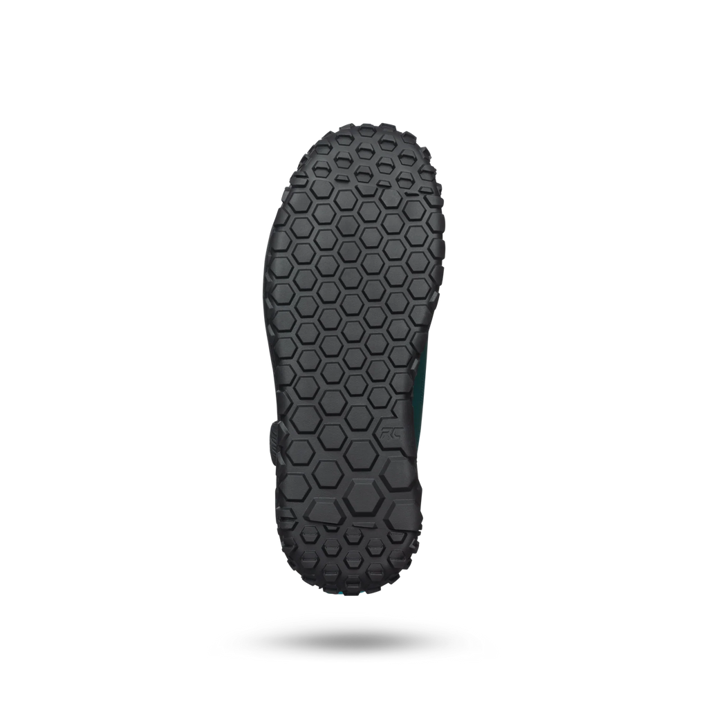 Black sole of a shoe with a textured pattern on a white background
