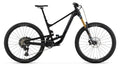 A black full-suspension mountain bike with a gold Fox front fork, knobby Maxxis tires, and a rear shock, shown from a side profile on a white background.