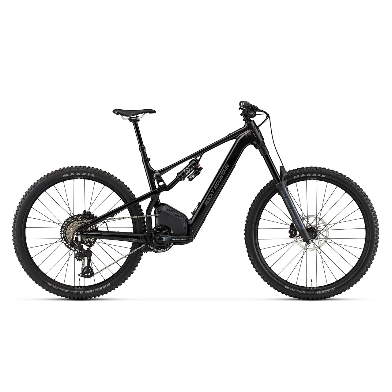 A Rocky Mountain full-suspension mountain bike with a dark teal and black frame, black components, and Maxxis tires, shown from a side profile on a solid white background.