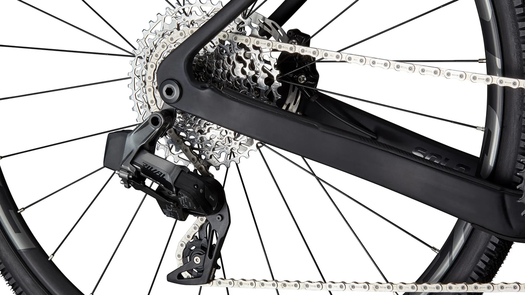 Close-up of a bicycle's gear system on a white background