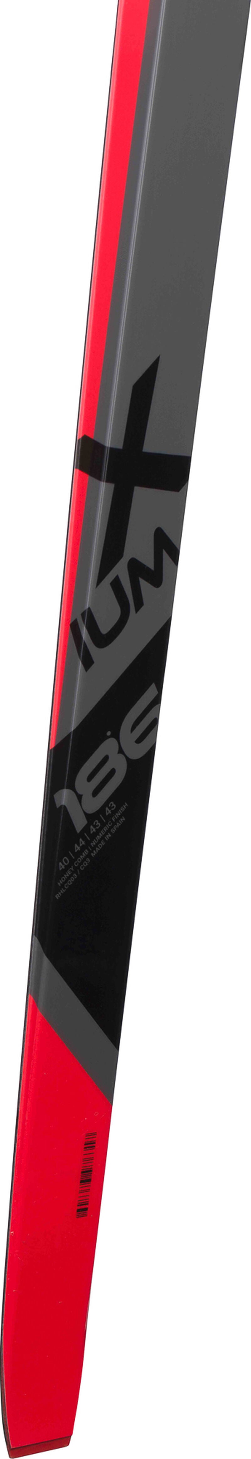 Red and black ski with a brand logo on a white background