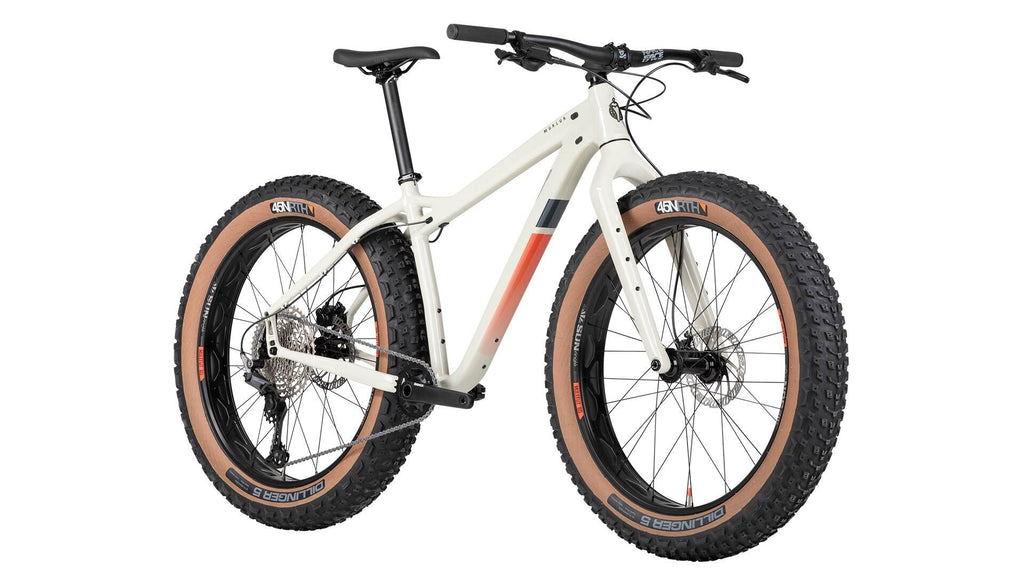 White fat-tire bicycle with black components on a white background