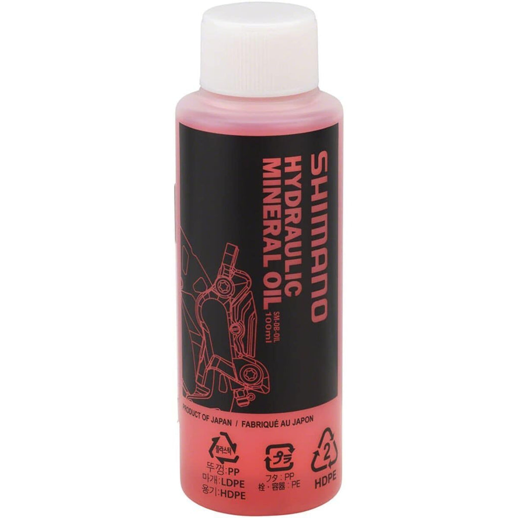 Shimano hydraulic mineral oil bottle on a white background