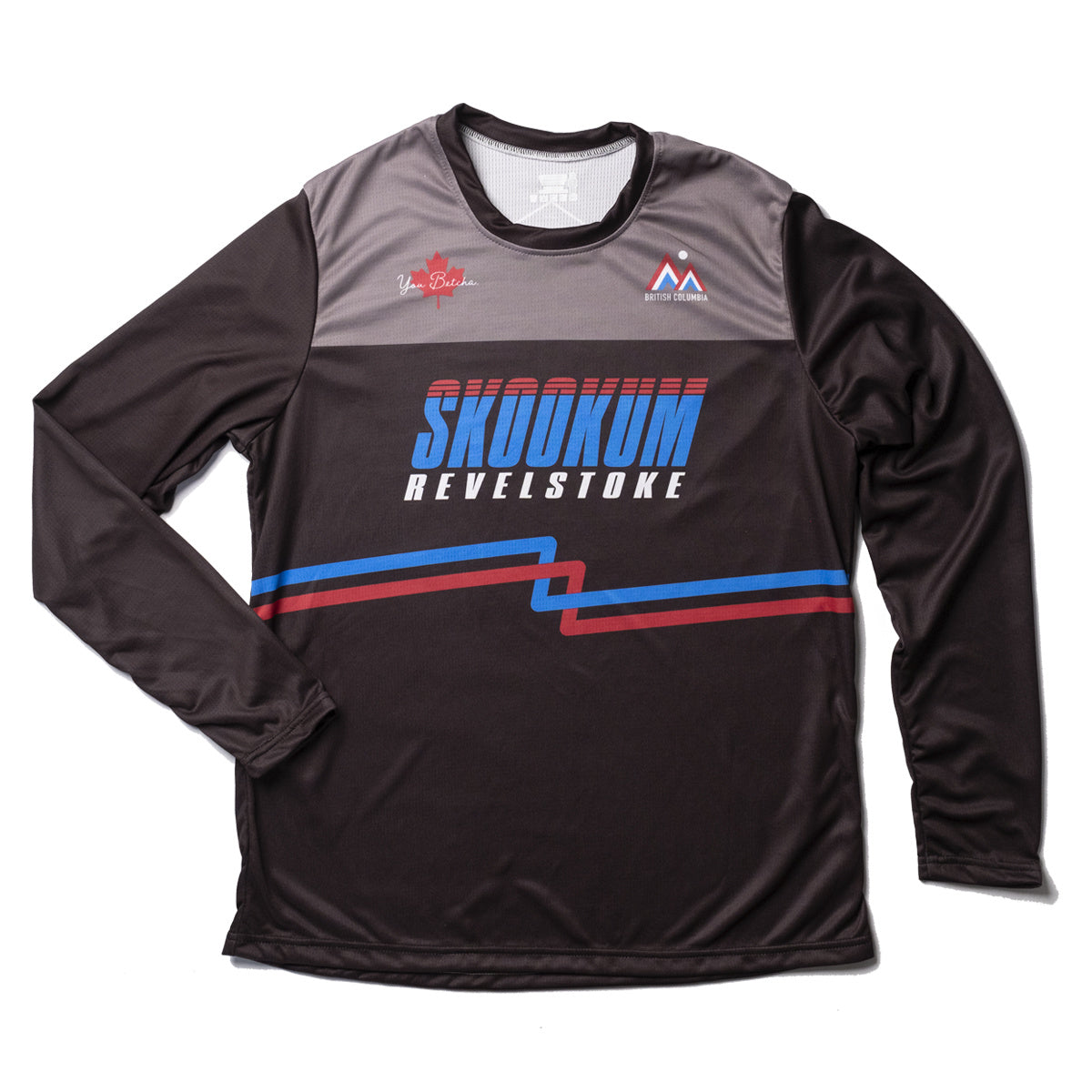 Long-sleeve shirt with 'Skookum Revelstoke' branding on a white background