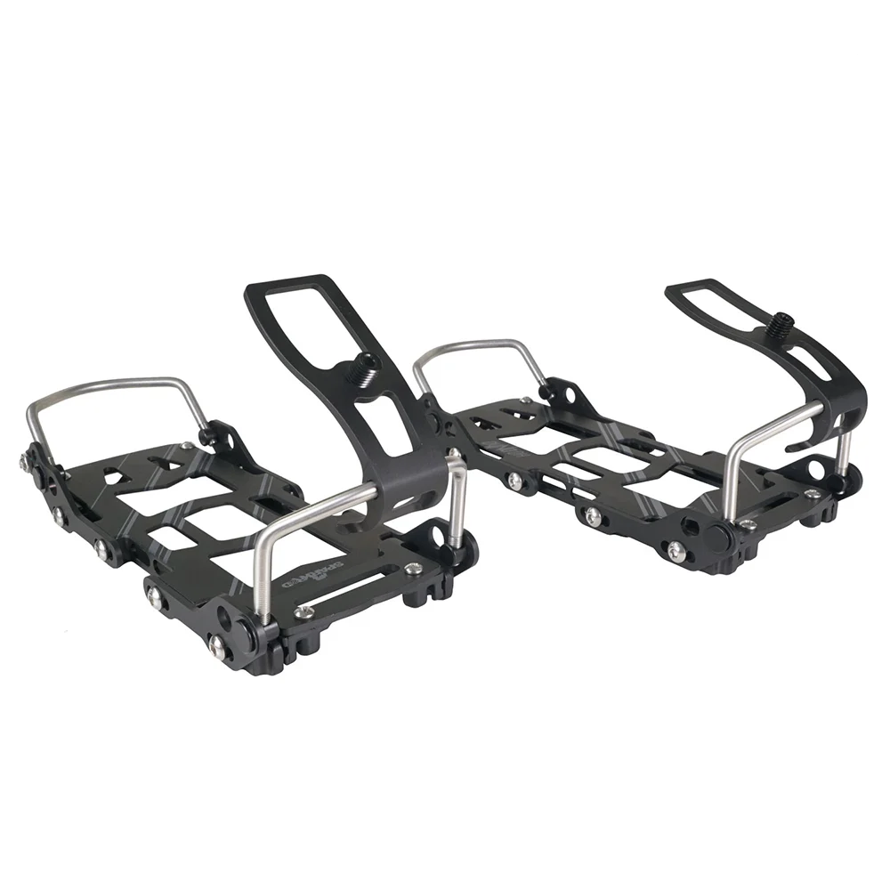 Pair of black snowboard bindings on a white background