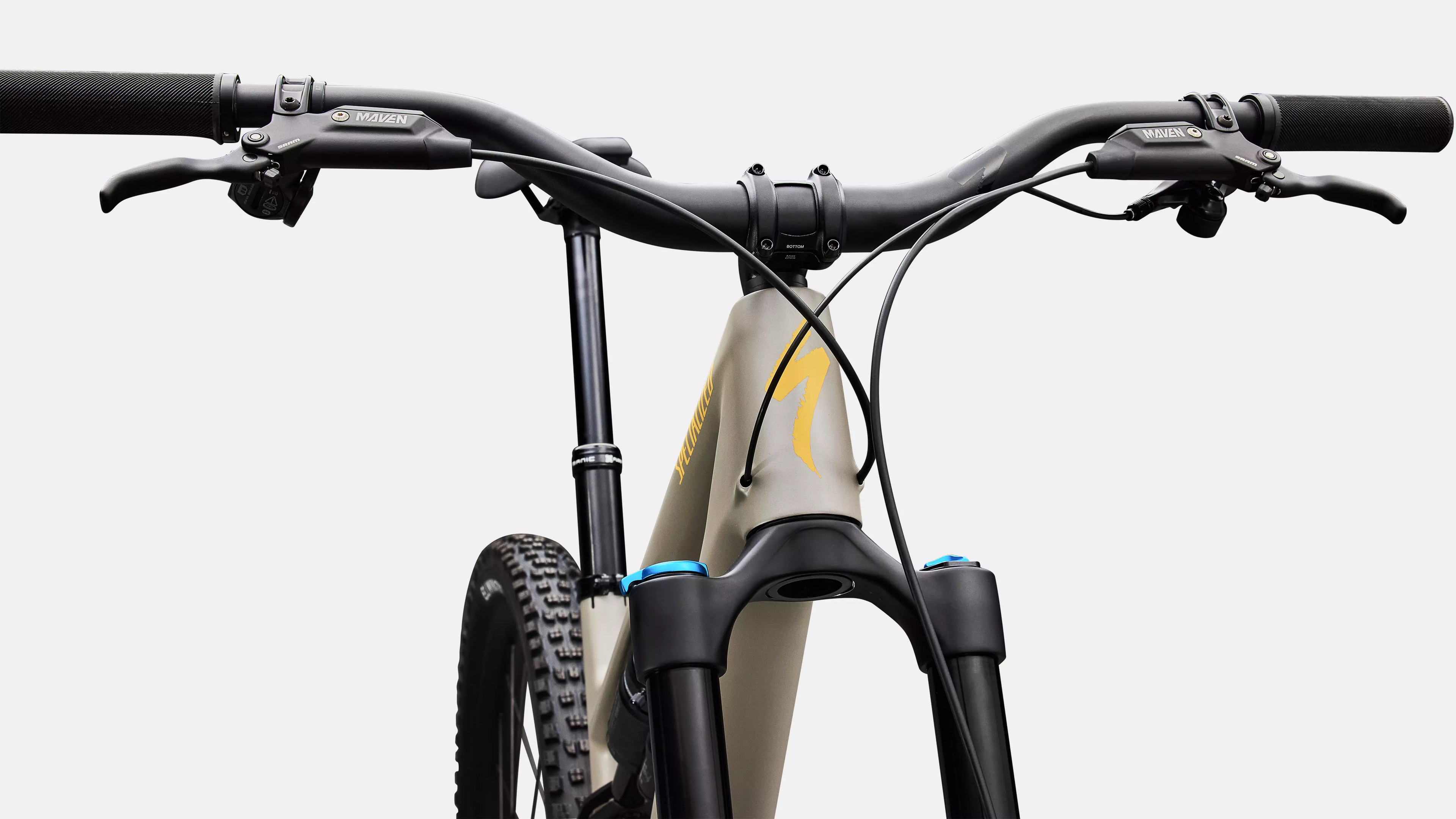 Close-up of a bicycle handlebar with a blurred background
