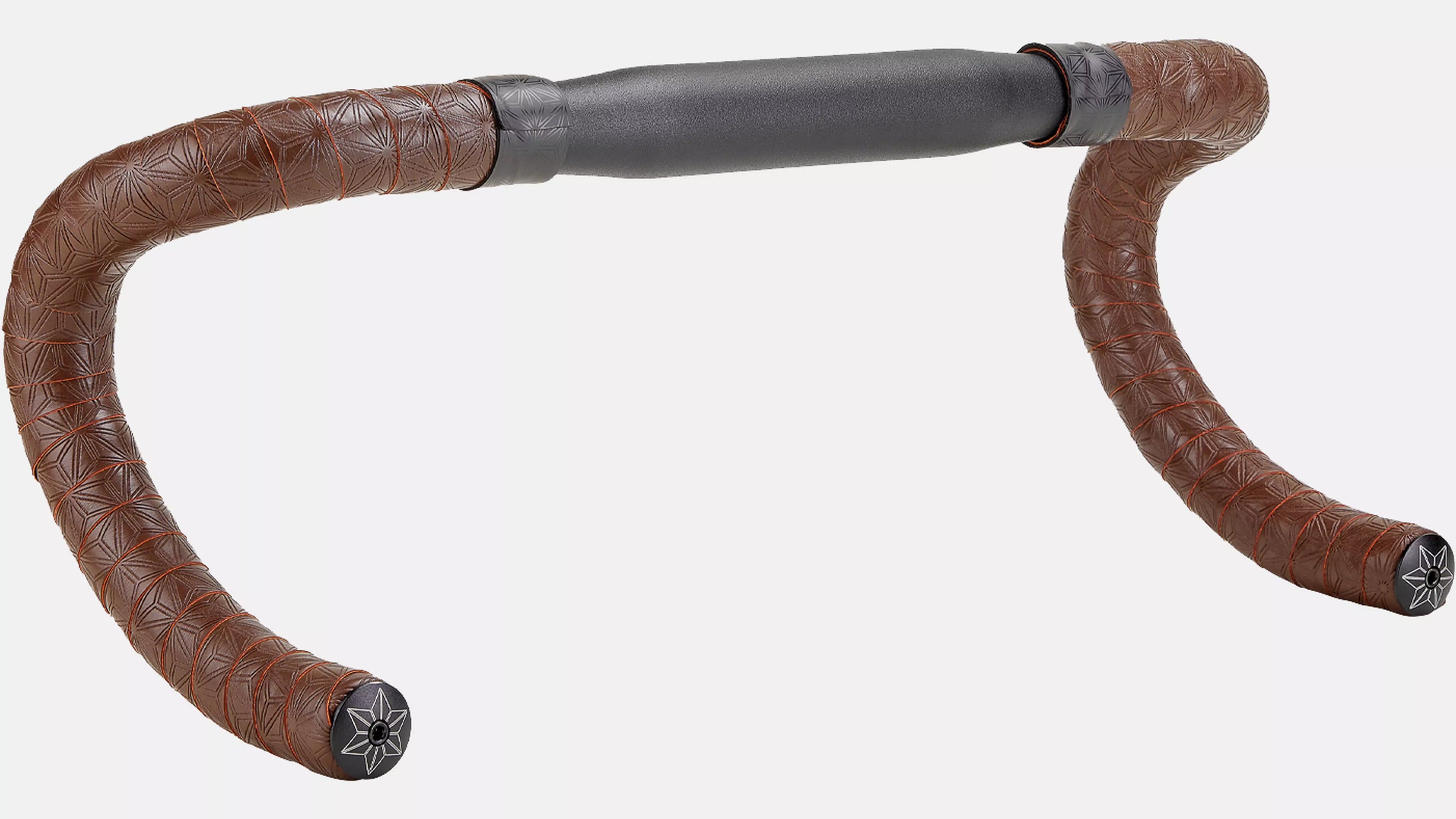 Brown leather handlebar tape wrapped around a drop-bar bicycle handlebar, with a dark gray foam center section and black end caps, shown on a plain light gray background.