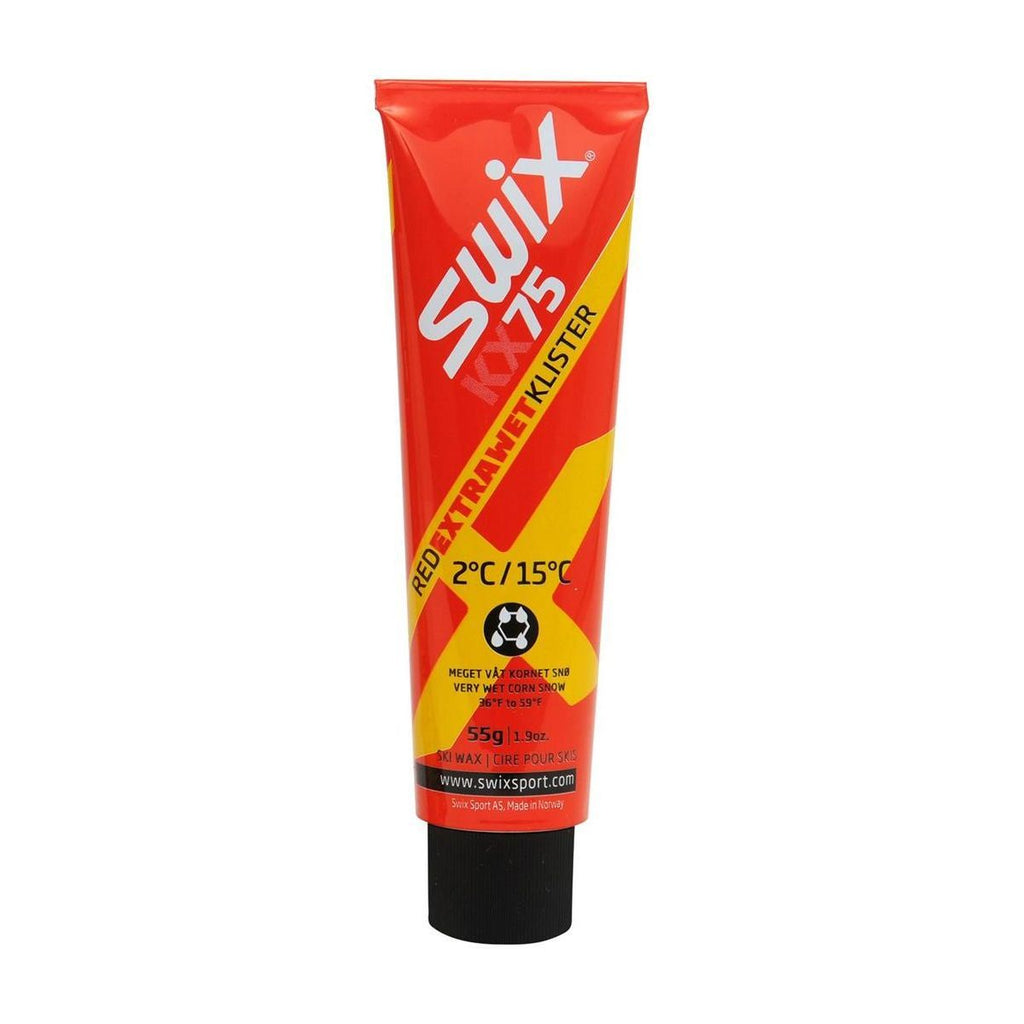 Red Swix ski wax tube on a white background