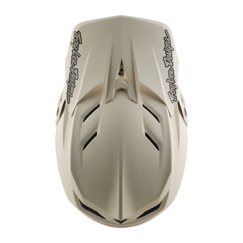 Tan motorcycle helmet with 'Taylor Helmets' branding on a white background