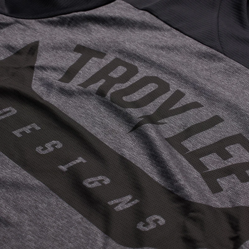 Gray t-shirt with 'Troy Lee Designs' branding on a plain background