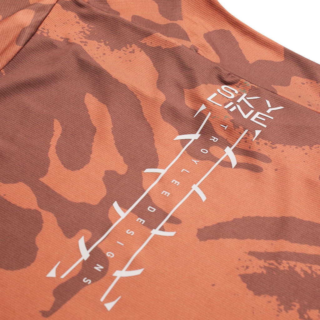 Camouflage-patterned shirt with 'Sky Line' branding on a white background