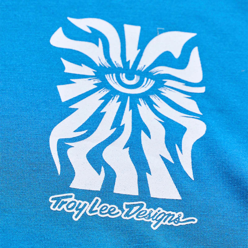 White abstract design on a blue background with 'Troy Lee Designs' text.