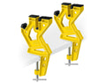 Two yellow clamps on a white background