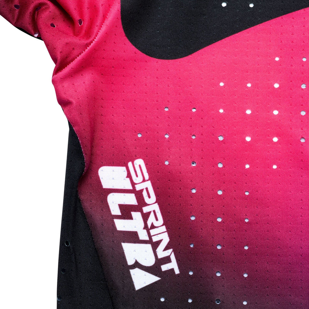 Close-up of a red and black athletic shirt with 'Sprint Ultra' branding.