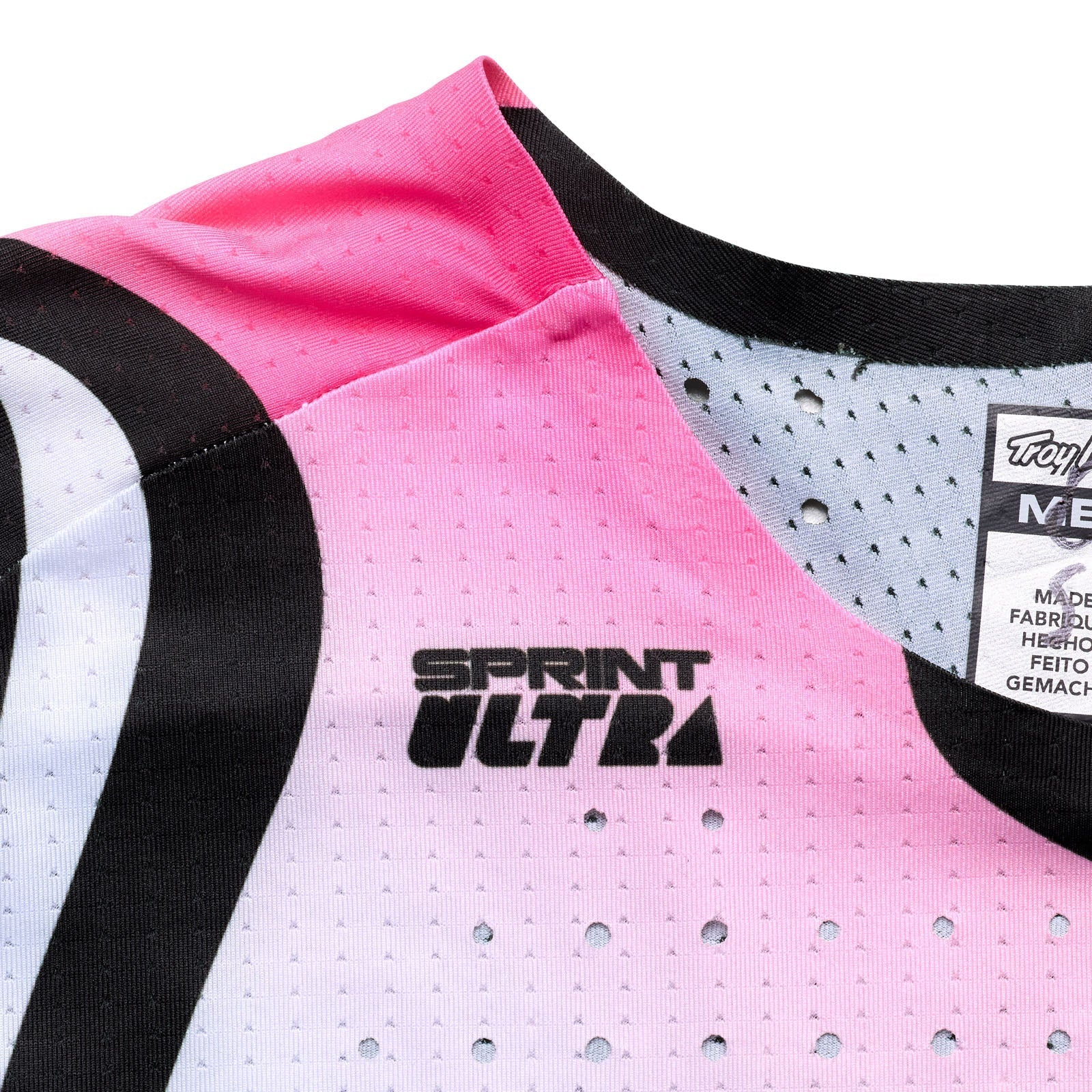 Close-up of a pink athletic shirt with 'Sprint Ultra' text and brand label.