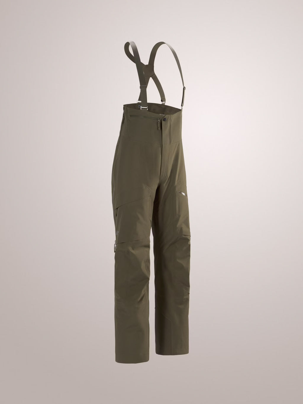 Green bib overalls on a light gray background