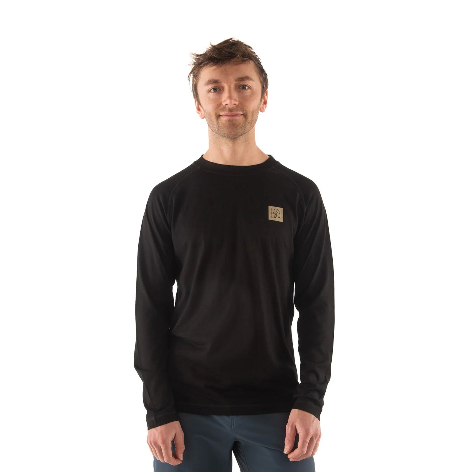 Man wearing a black long-sleeve shirt with a logo on a white background