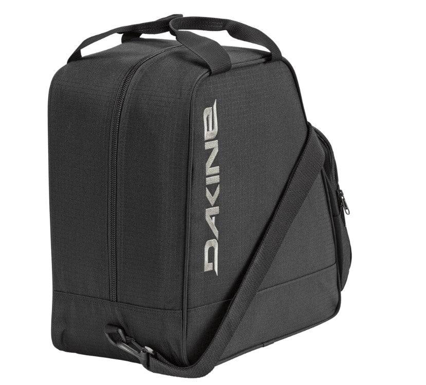 Black Dakine boot bag on a white background