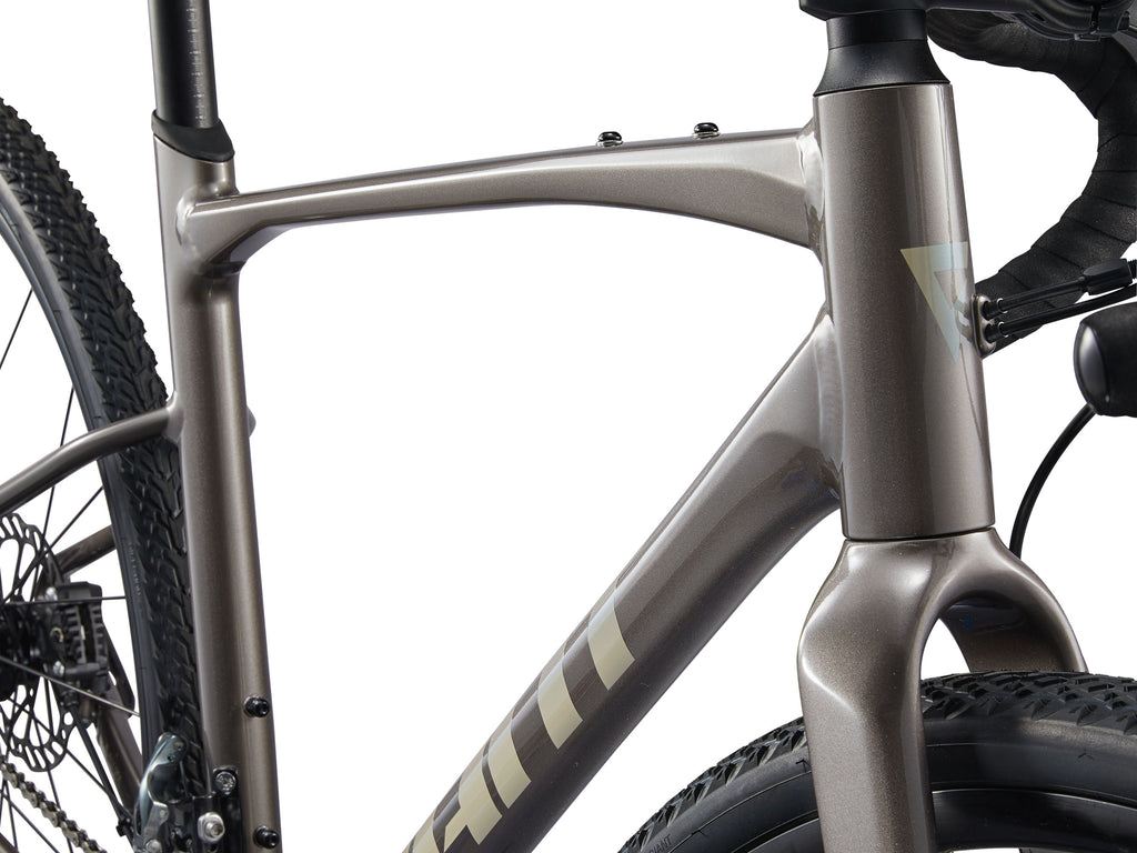Close-up of a bicycle frame with 'Giant' branding on a white background
