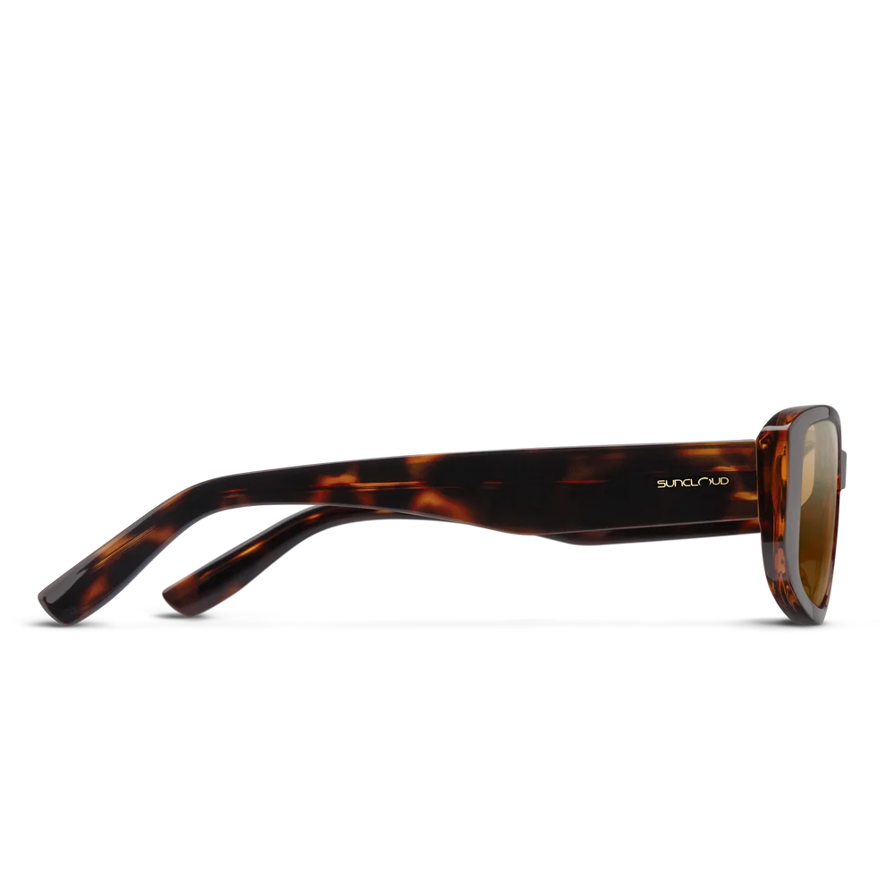 Side profile of square-frame sunglasses with a dark brown and amber tortoiseshell acetate frame and brown lenses, featuring the brand name 'suncloud' printed on the temple arm, set against a plain white background.