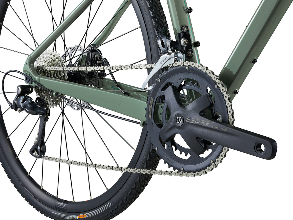 Close-up of a bicycle chain and gear system on a white background