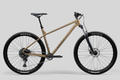 Beige mountain bike on a gray background