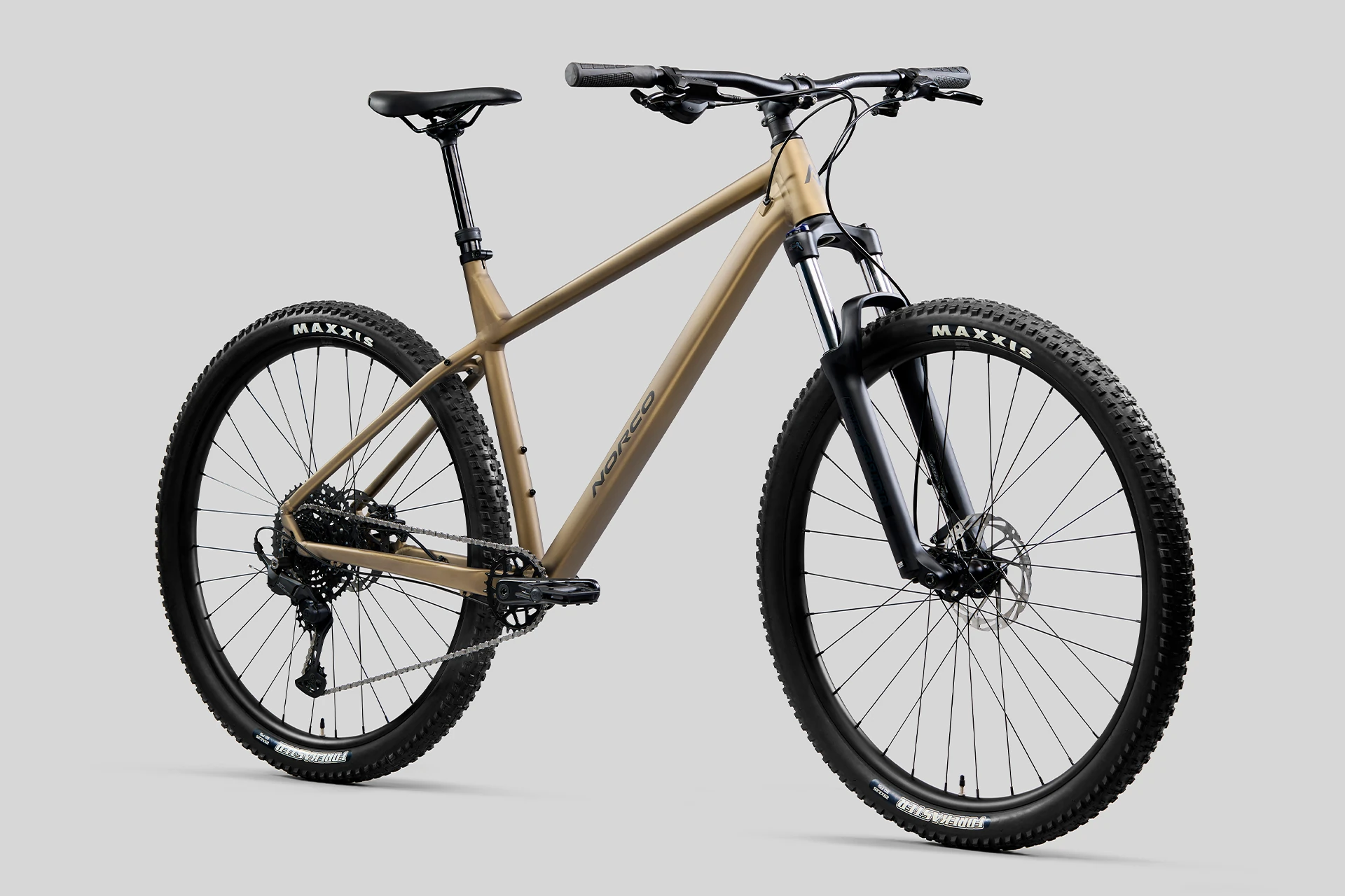 Beige mountain bike on a gray background