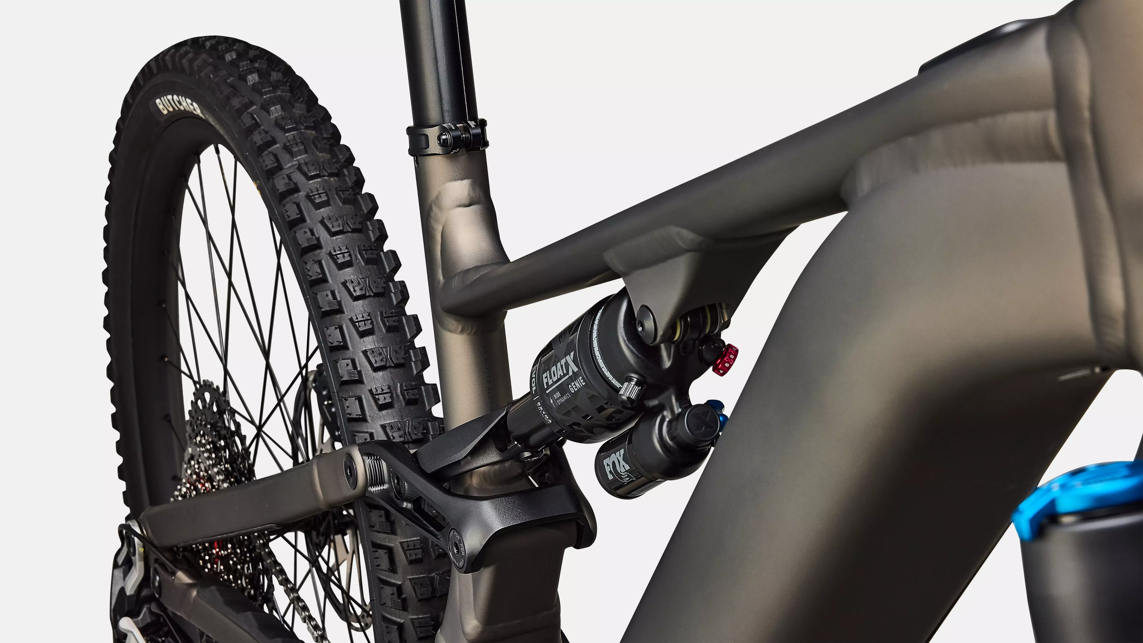 Close-up of a mountain bike's suspension fork on a white background