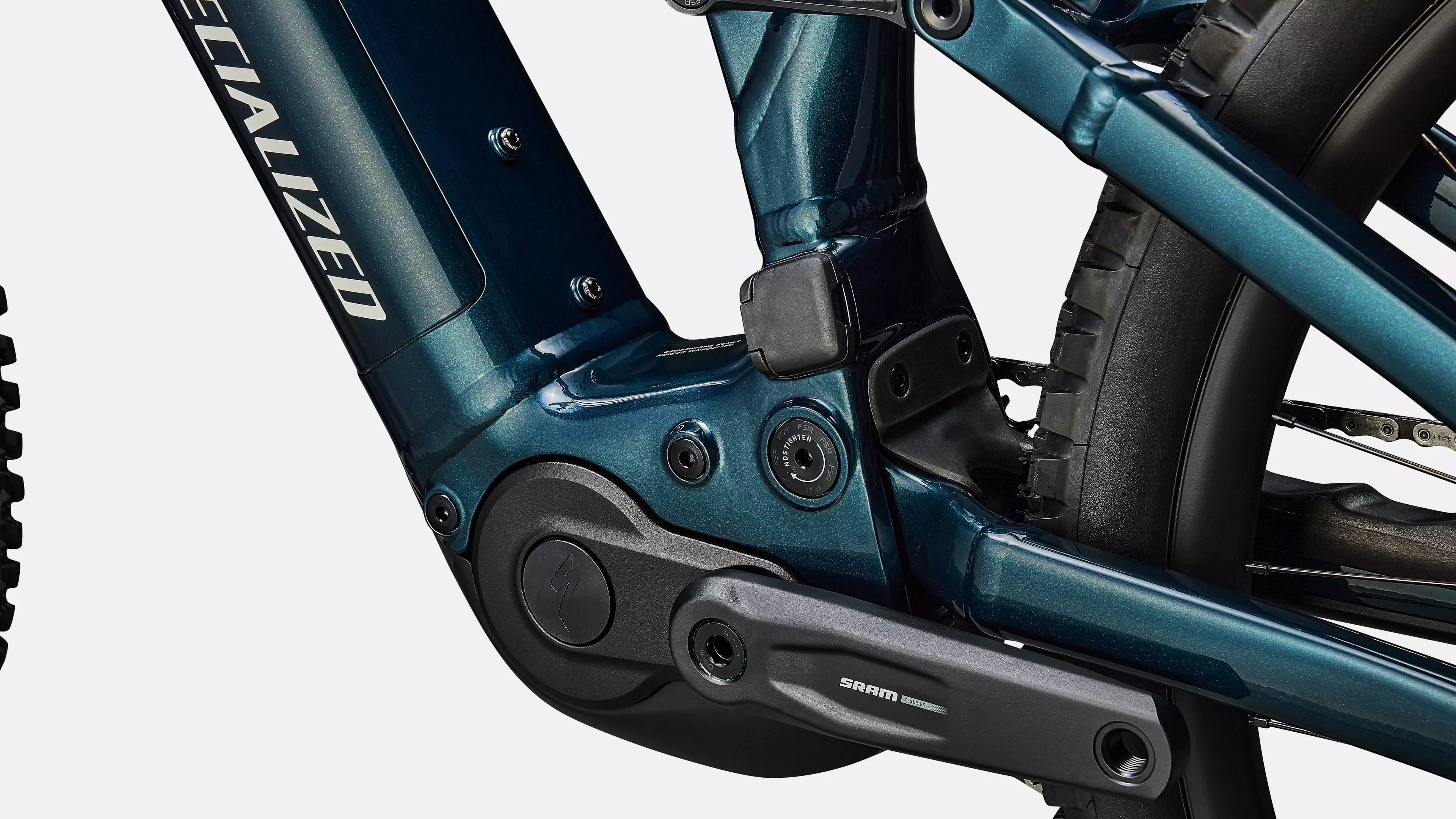 Close-up of a blue bicycle frame with 'Specialized' branding on a white background
