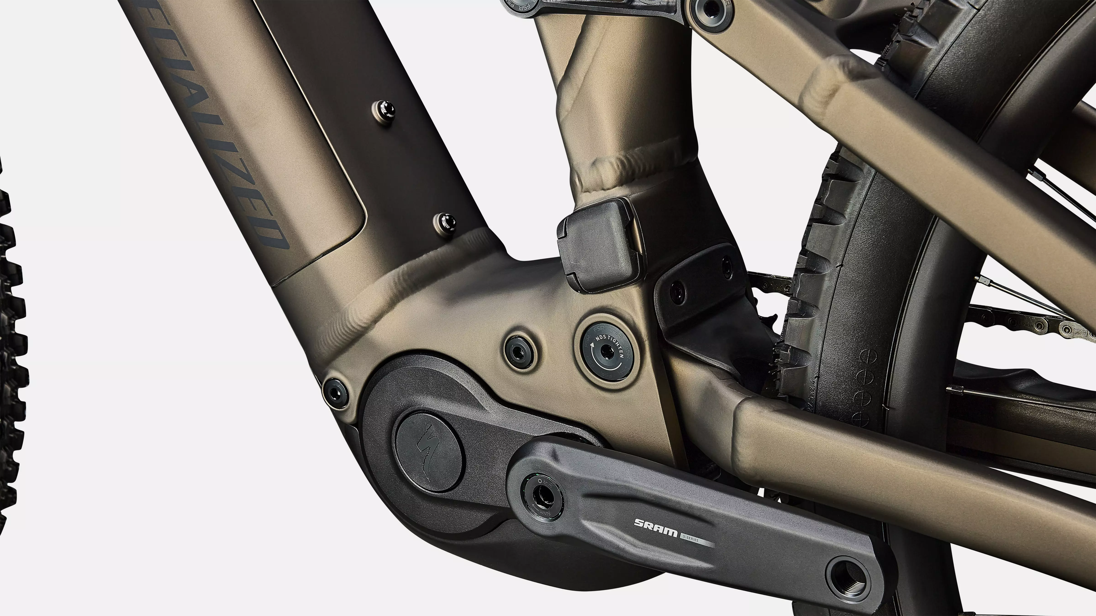 Close-up of a bike frame with a visible brand logo on a white background