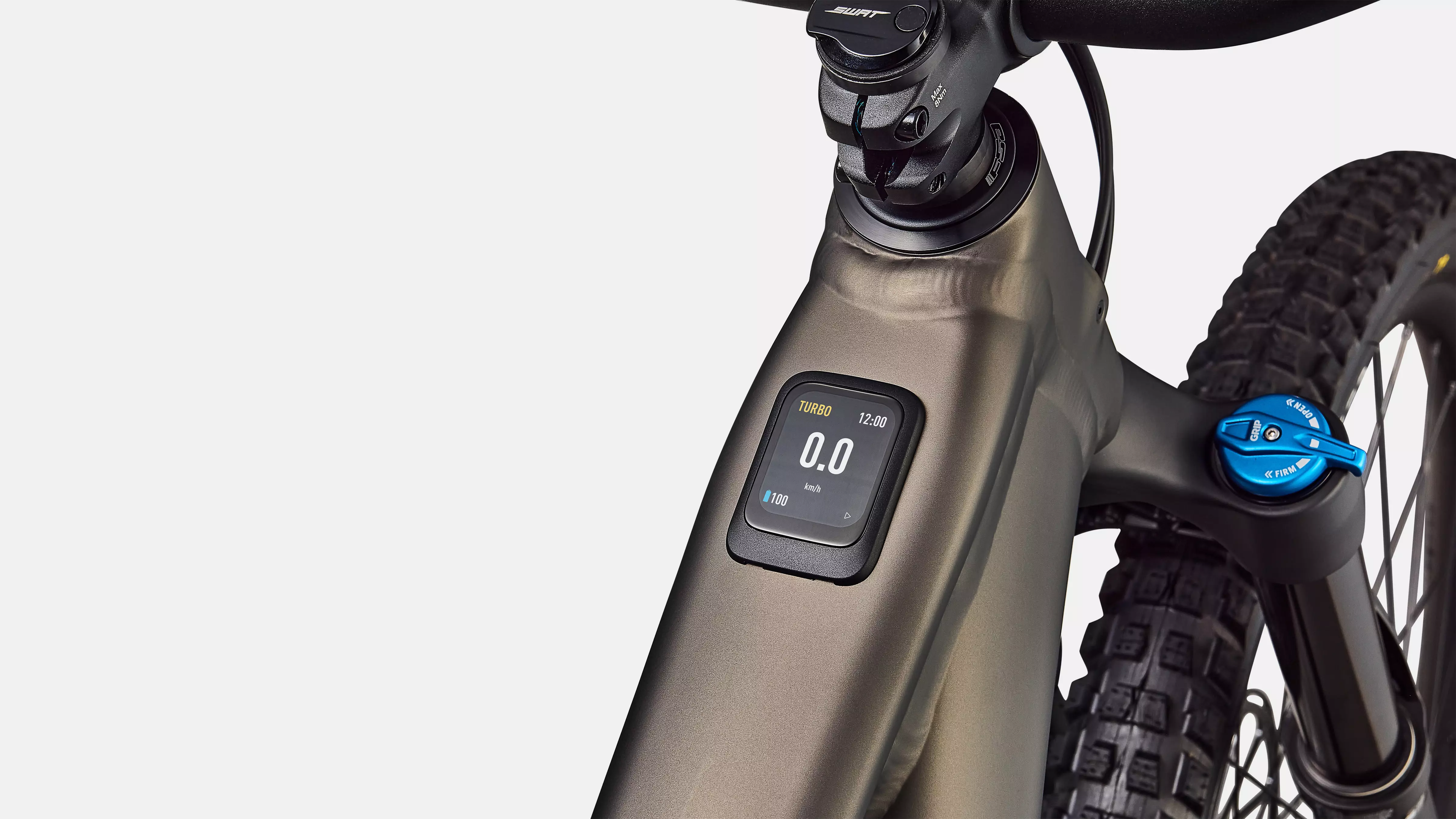 Close-up of a bicycle with a digital display on a white background