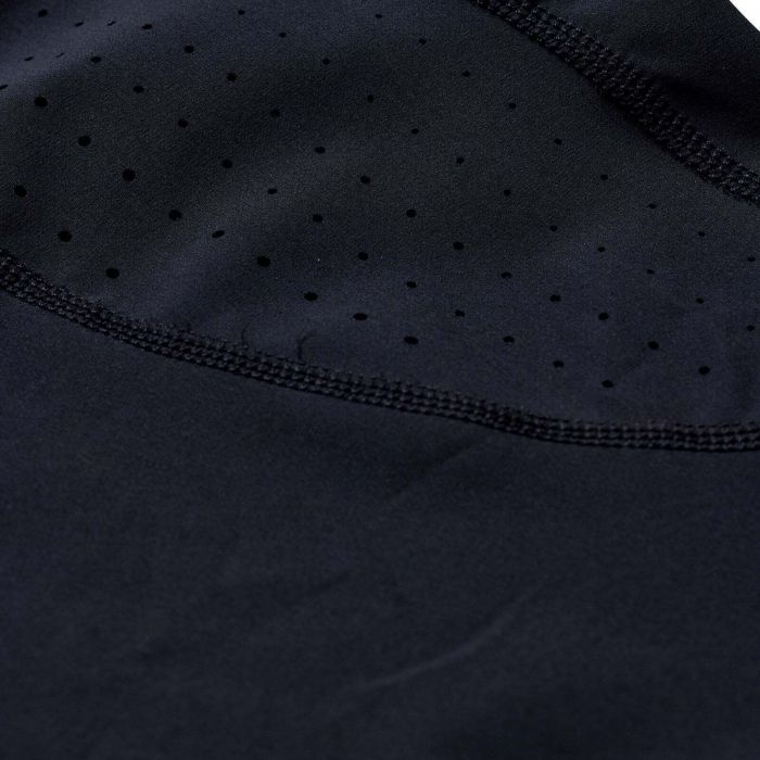 Close-up of black fabric with a subtle pattern