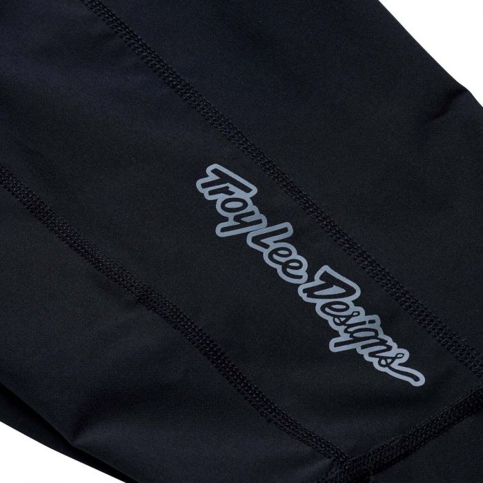 Black fabric with 'Troy Lee Designs' logo embroidered on it
