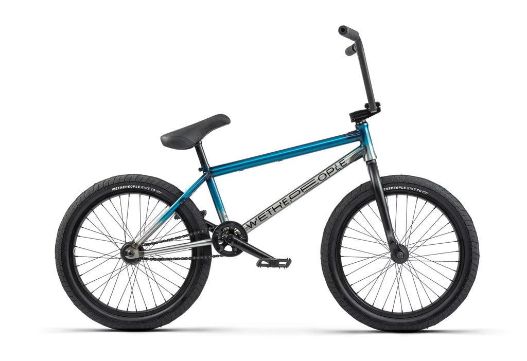Blue bicycle with black seat on a white background