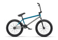 Blue bicycle with black seat on a white background