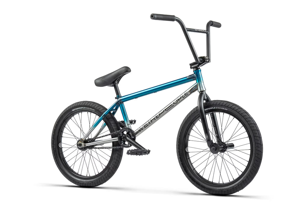 BMX bike with blue frame and black wheels on a white background