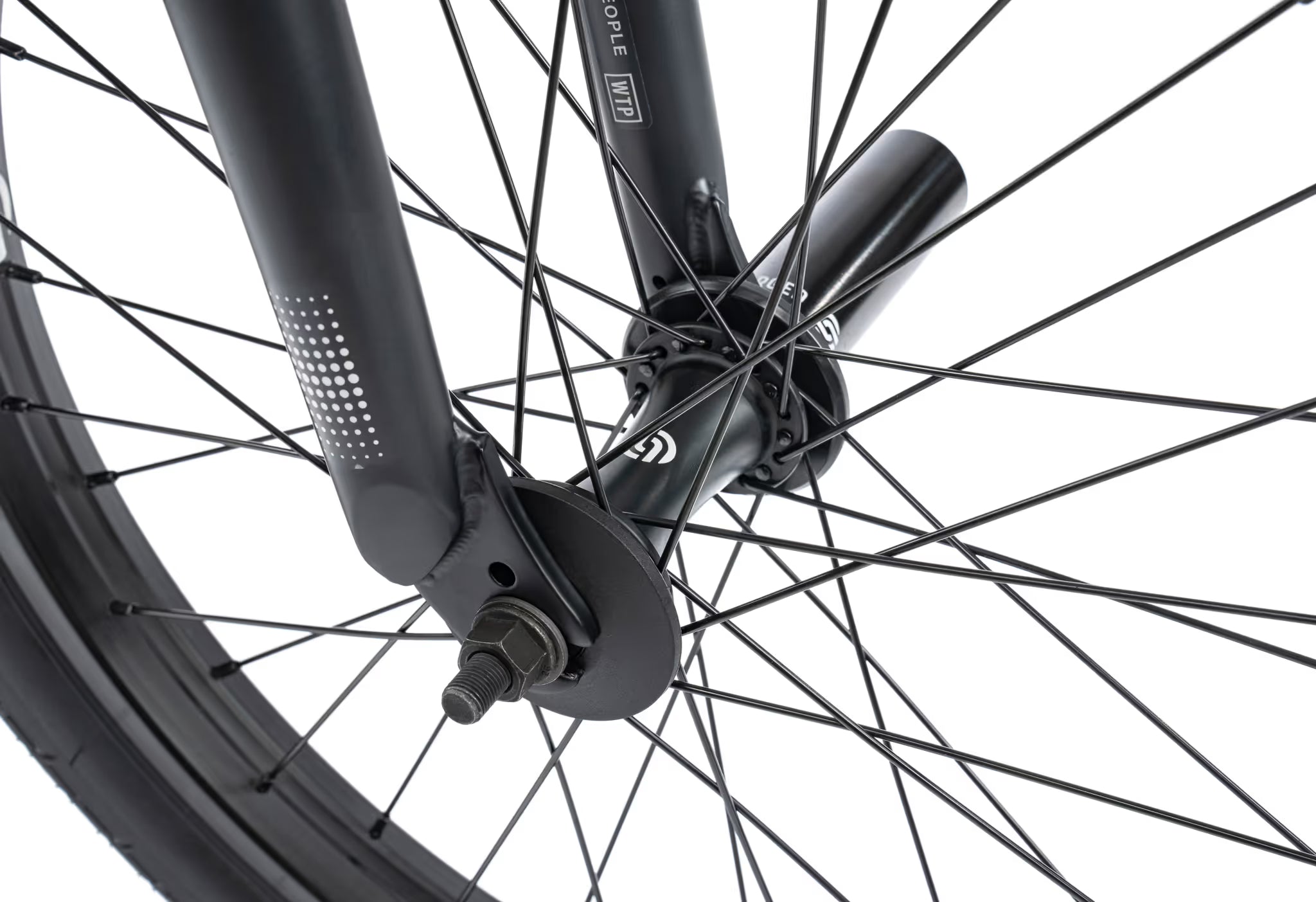 Close-up of a bicycle wheel with a white background